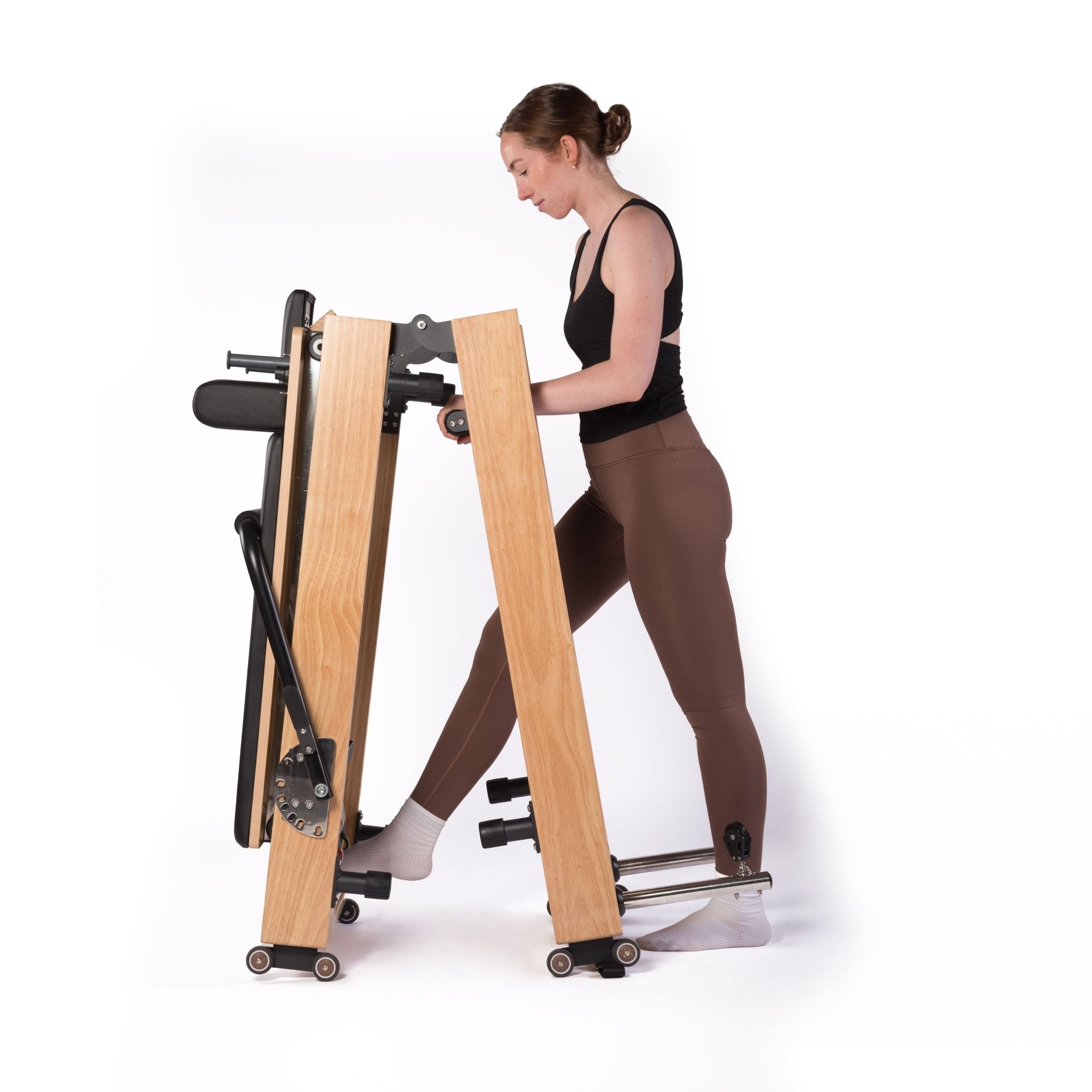 Pilates reformer che si piega in due