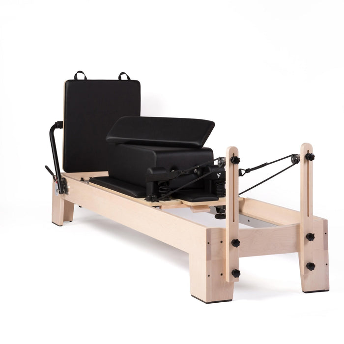 Pilates reformer in legno d'acero Pilateo