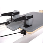 carrello del reformer con maniglie e poggiaspalle