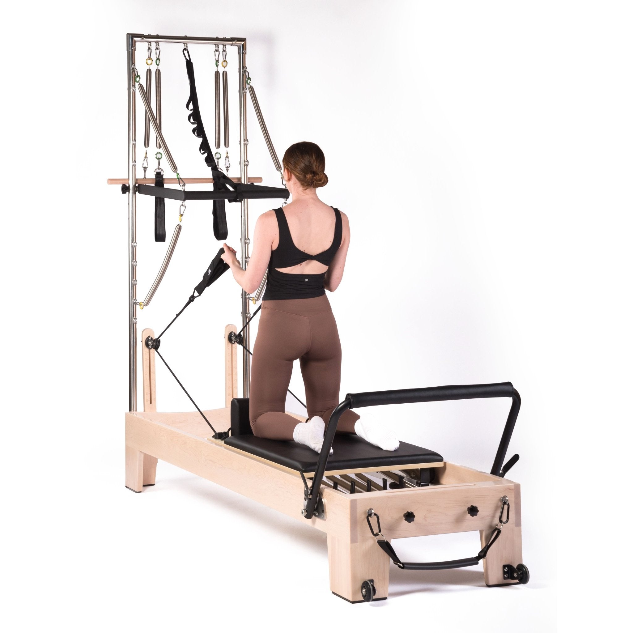 esercizi pilates reformer tower